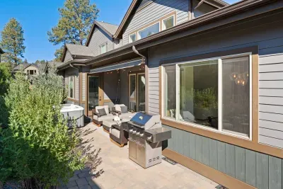 Patio: Large salt water hot tub (professionally cleaned and maintained between each stay), propane firepit, comfortable outdoor seating, BBQ, cafe lights. Please note this is an unfenced patio. Opens to large grassy yard.