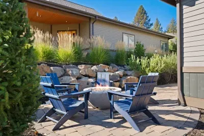 Patio: Large salt water hot tub (professionally cleaned and maintained between each stay), propane firepit, comfortable outdoor seating, BBQ, cafe lights. Please note this is an unfenced patio. Opens to large grassy yard.