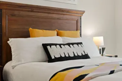 Bedroom 3: Queen bed with private large walk-in closet, Smart TV, dresser and access to a shared bath (jack n' jill connected full bath). Bedrooms come with full sets of linens, pillows, and extra blankets and pillows.