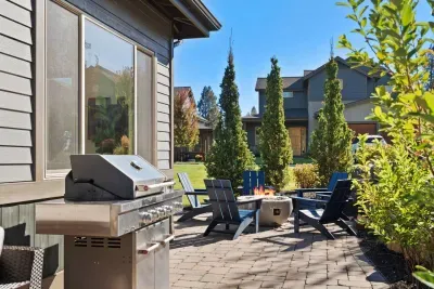 Patio: Large salt water hot tub (professionally cleaned and maintained between each stay), propane firepit, comfortable outdoor seating, BBQ, cafe lights. Please note this is an unfenced patio. Opens to large grassy yard.