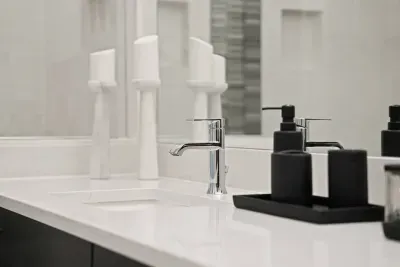 Bathroom 1: Primary En suite bathroom with dual sink vanities, large walk in shower with seating, and private toilet room with TODO bidet toilet. Bathrooms come with all soaps (hair, body, hand), towels and bathmats, and hair dryer.