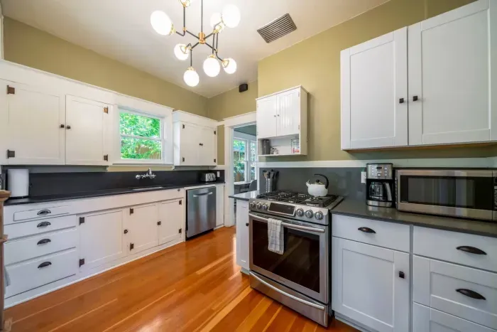 The kitchen comes fully-stocked with paper goods, dish towels, serveware and utensils, simple spices and oils, and soaps.