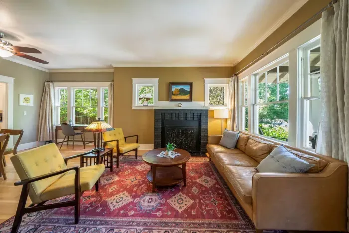 The main living room offers comfortable seating, a remote-controlled gas fireplace, brochures for things to do around Bend, and a large flat screen smart TV with cable and access to login to any apps you have.