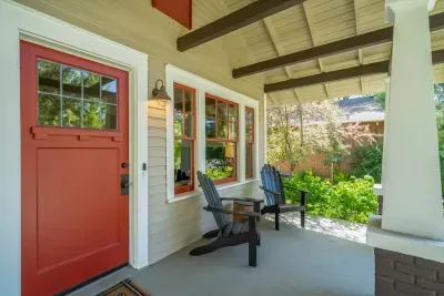 Guests love relaxing in these adirondack chairs as neighbors walk by; a perfect spot for a cup of coffee (or cocktail!)