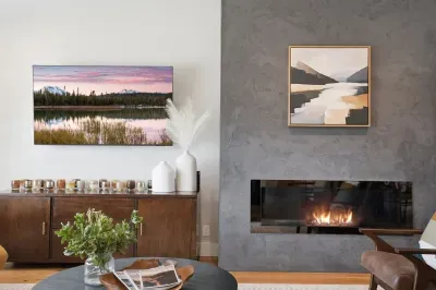 Modern lounge with linear fireplace, smart TV, and cozy ambience