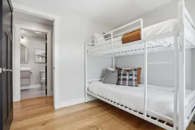 Bright bunk room with ensuite bath—perfect for kids and groups