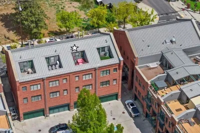 Rooftop terrace with seating and umbrella. Soak up the views to the river and Cascade Mountains!