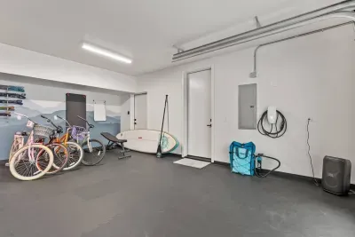 The wellness center has so many things to enjoy: cruiser bikes, treadmill, free weights and bench, two paddleboards, bluetooth speaker, tesla universal charger, and of course the incredible sauna and cold plunge!