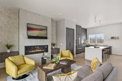 Stunning living room and open concept living. High end custom kitchen nearby with state-of-the-art appliances. An entertainer's dream! Living room opens to a south-facing balcony to welcome sunshine and fresh air!