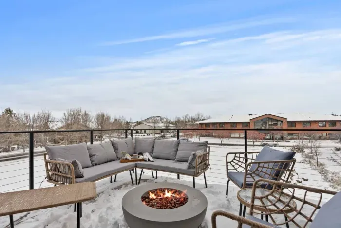 Third story balcony is a spot you won't want to miss. Outfitted with comfortable seating and a firepit hooked into the natural gas line, you'll never run out of warmth while spending time with family and friends!