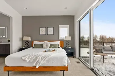 Primary room: King size bed, with incredible views from a large balcony with firepit and seating. Large walk in closet, Smart TV to stream your favorite shows, and a private luxurious bathroom with heated floors!