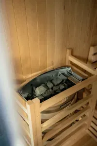 Pour water over the embers to create a steam sauna experience!