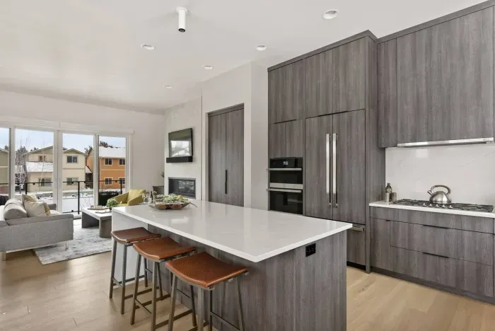 Full kitchen with beautifully integrated appliances. The kitchen comes fully stocked with all of the kitchenwares you'd have at home!