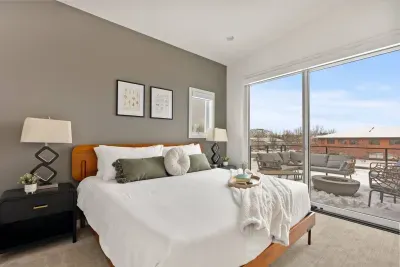 Primary room: King size bed, with incredible views from a large balcony with firepit and seating. Large walk in closet, Smart TV to stream your favorite shows, and a private luxurious bathroom with heated floors!