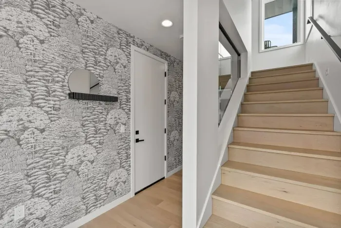 The foyer has been professionally designed and is a stunning spot to drop your coat and boots!