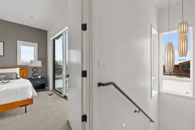 Primary room: King size bed, with incredible views from a large balcony with firepit and seating. Large walk in closet, Smart TV to stream your favorite shows, and a private luxurious bathroom with heated floors!