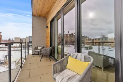 Second story balcony off of main living area, south facing and perfect for a cup of coffee or glass of wine!