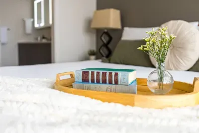 Primary room: King size bed, with incredible views from a large balcony with firepit and seating. Large walk in closet, Smart TV to stream your favorite shows, and a private luxurious bathroom with heated floors!