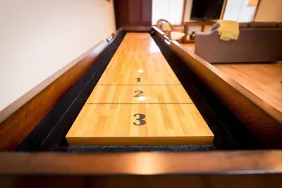 Shuffleboard located in the guest house!
