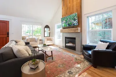 Main house living room with smart TV and gas fireplace