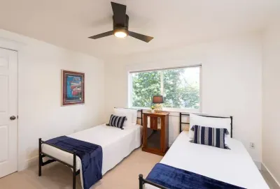 Upstairs 2 twin bed room with access to a pack n play