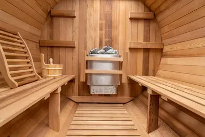 Private cedar sauna with cozy benches for a spa-like retreat