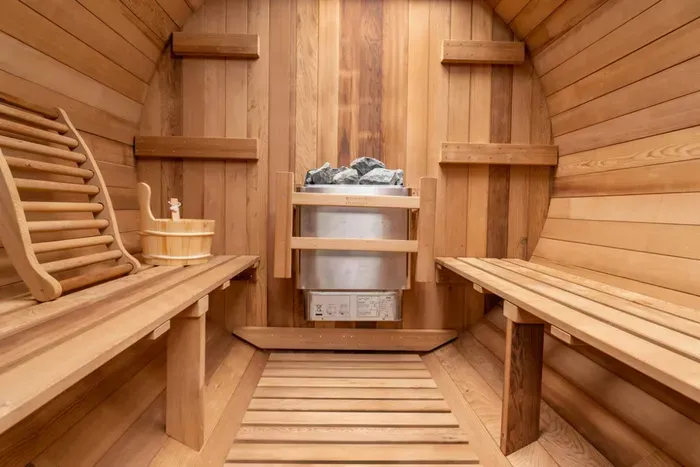 Private cedar sauna with cozy benches for a spa-like retreat