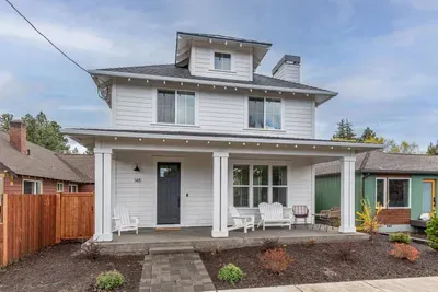 Charming modern farmhouse with a covered porch and inviting curb appeal
