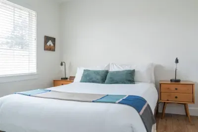 Bright, cozy bedroom with natural light and stylish modern touches