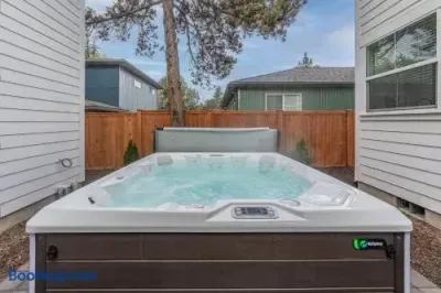 Private fenced hot tub for relaxing soaks in a quiet outdoor setting