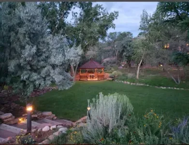 Pass by the lovely gazebo on your way to the pool.