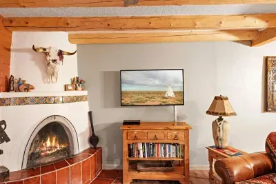 Enjoy a quiet evening in front of the fireplace or watch a film on the large SMART TV.