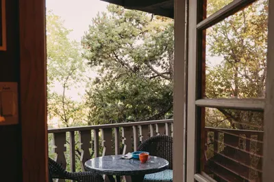 The private balcony awaits you from either bedroom.