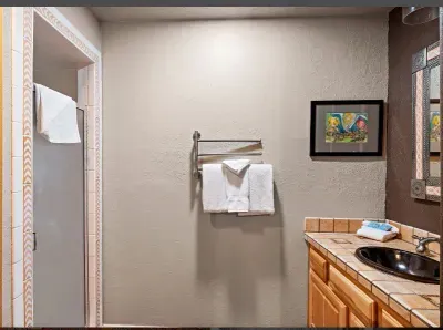 Yes, there is unique artwork in the bathroom, as well!