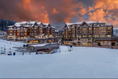 Multiple ski lifts, coffee shops, and ski gear shops are directly in front of the Resort.