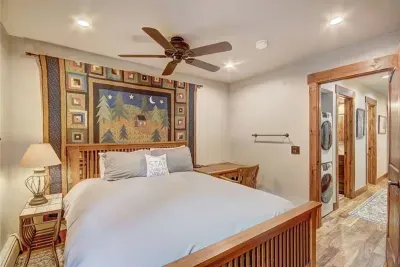 Perfect place to slip away to get some work done- Queen bedroom #2 with writing desk, Smart TV and plenty of storage.