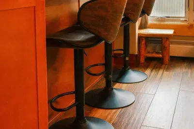 Pull up a stool and join the conversation from the kitchen or the living room.