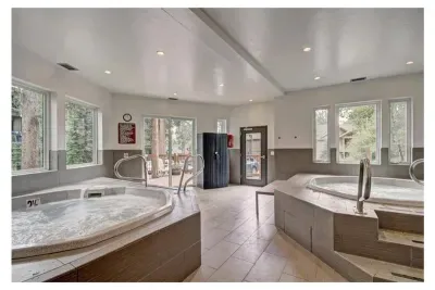 Community hot tubs in the building next door- just a few steps away!