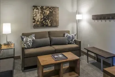 Main living space- living room, kitchenette, sofa bed, Smart TV and bathroom attached to the Main Bedroom.