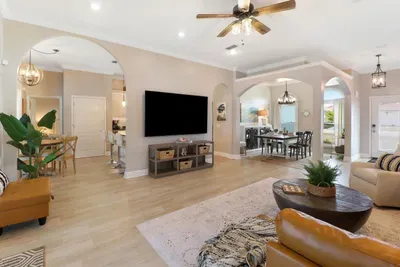 Open concept family room, dining room and kitchen