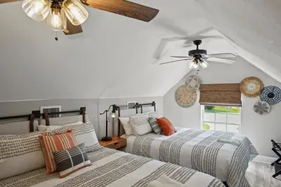 loft bedroom that is up a flight of stairs. the room has it's own thermostat.