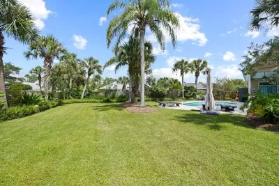 the lot is a large pie shape with a quiet backyard