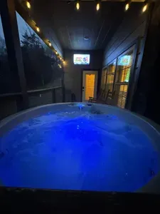 Lower level outdoor 6 person hot tub with outdoor TV