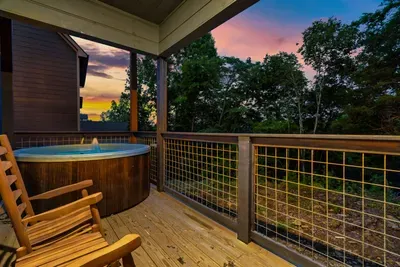 Hut tub area with outdoor TV, on lower level