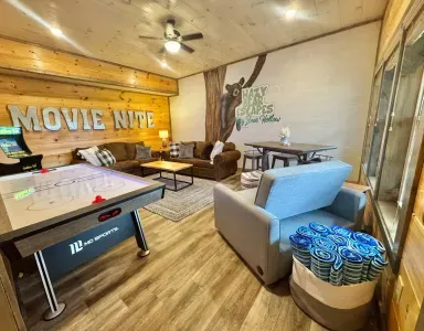 Lower level movie room/game room and attached bunkroom and full bathroom