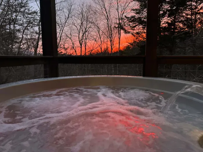 Lower level outdoor 6 person hot tub with outdoor TV 