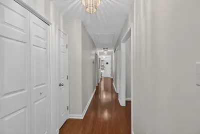 Hallway Upstairs looking from kitchen to front door.