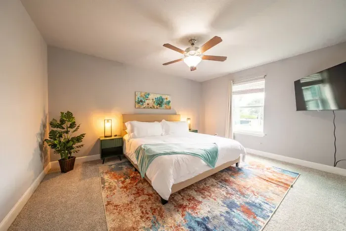 Bright Bedroom with Colorful Rug