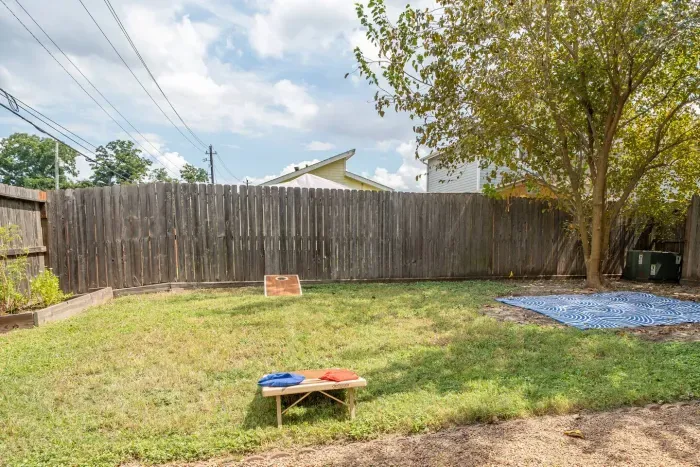 Backyard with Cornhole