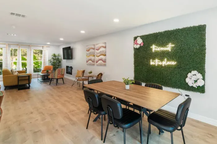 Bright Living Room with Green Wall